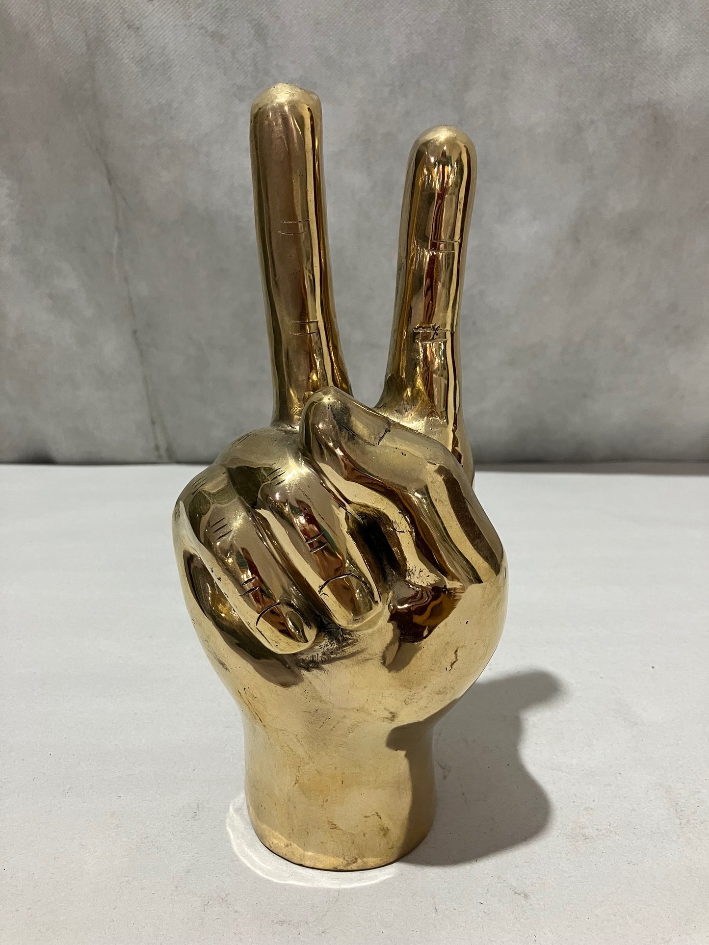 Peace out hand or Giving the Bird