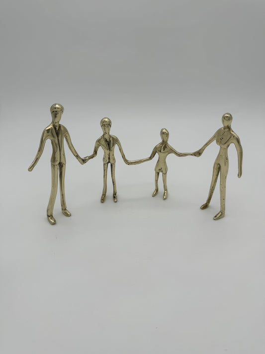 Family holding hands in line